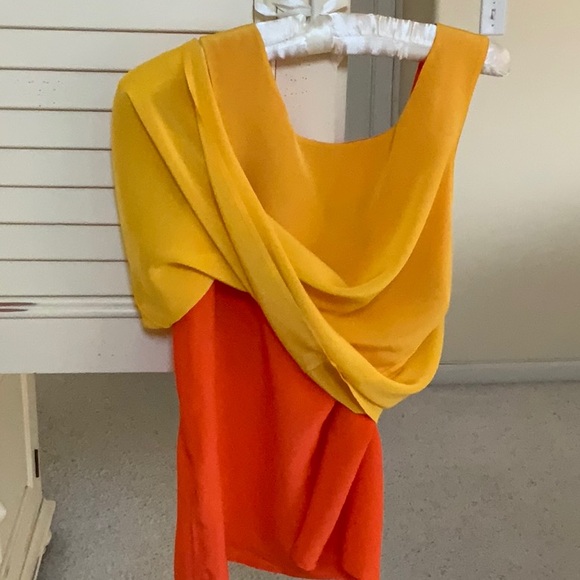 Silk top in orange on one side and reversible to yellow .  Size medium 100% silk - Picture 5 of 5
